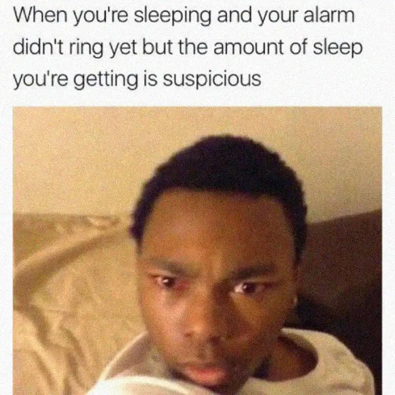 Meme with a guy suddenly waking up, red eyes, staring into space, text: When you're sleeping and your alarm didn't ring yet but the amount of sleep you're getting is suspicious.
